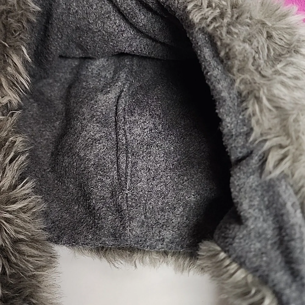 Plush Elephant Hat with Pink Ears, White Tusks, And Adorable Trunk.
